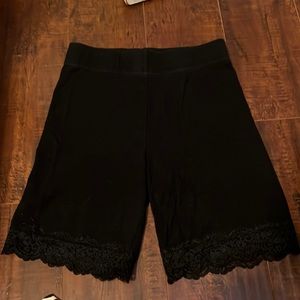 Black biker shorts with lace trim